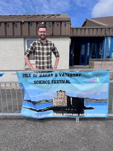 JP in front of IBVSF sign