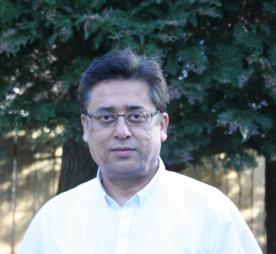 Headshot of Dr Sharma